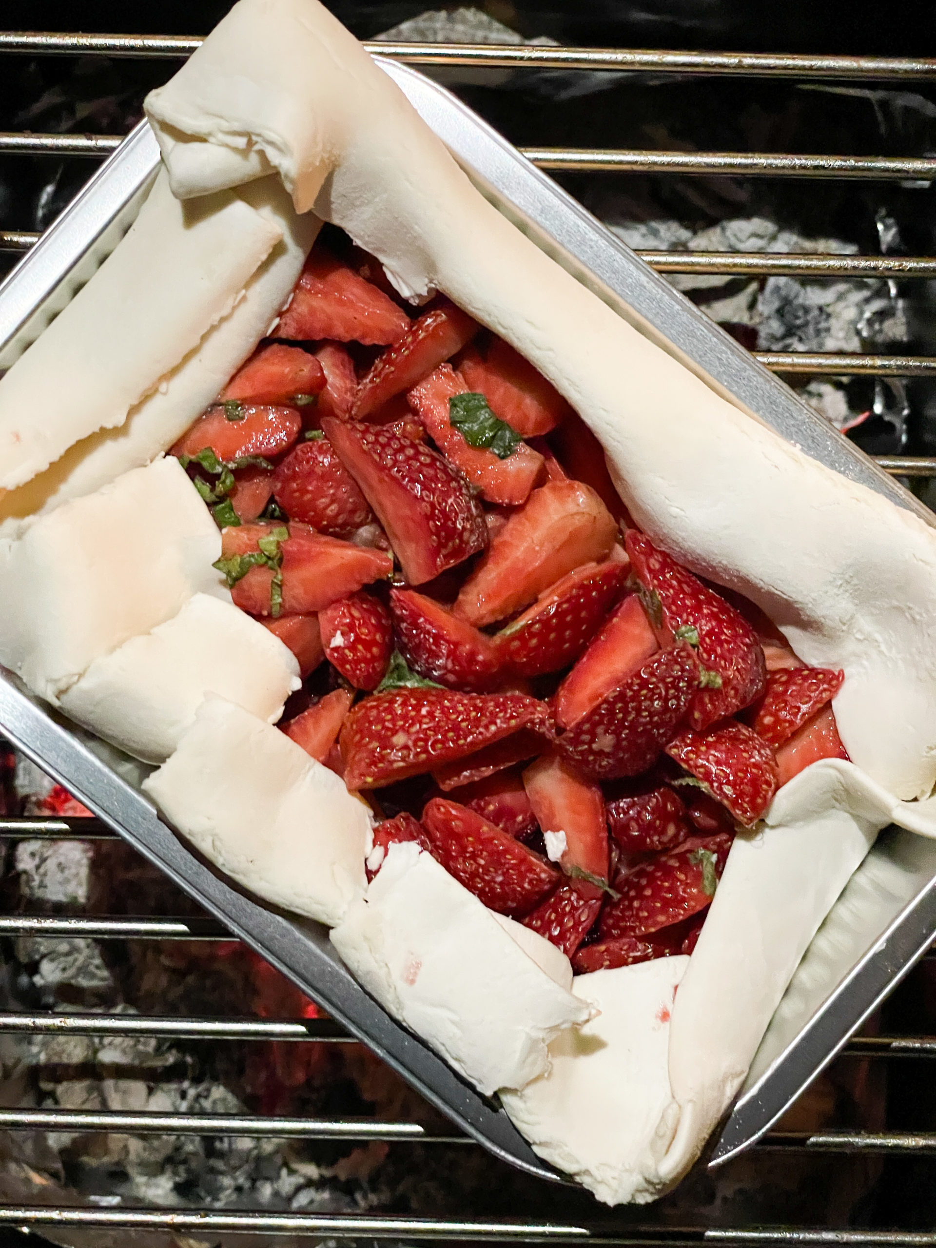 gluten-free strawberry cake in a BBQ pan