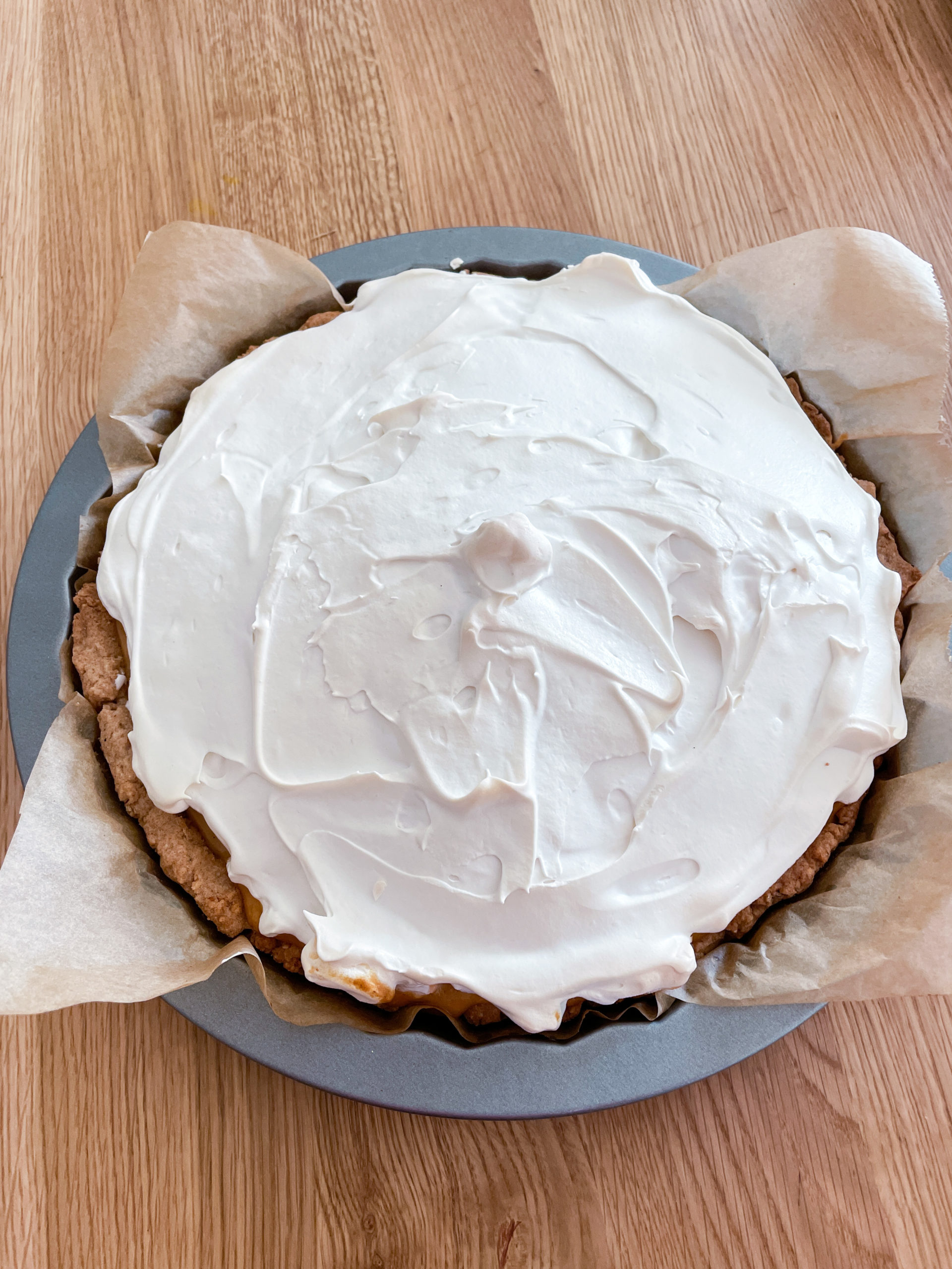 base with curd and meringue topping